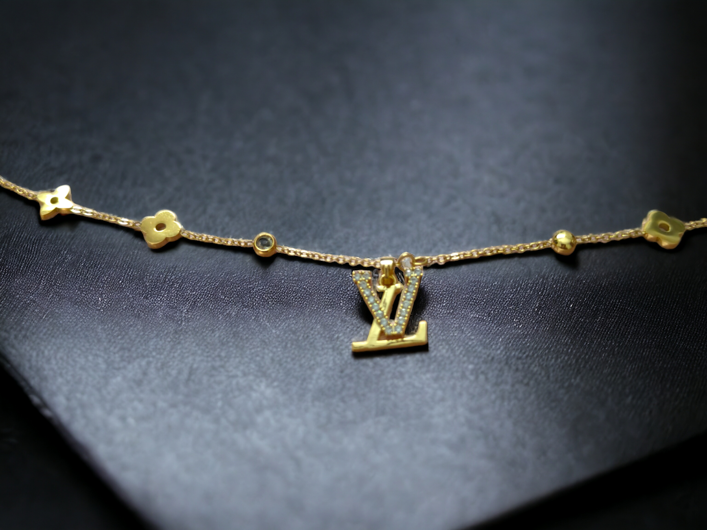 Radiant Gold 'V' Charm Necklace