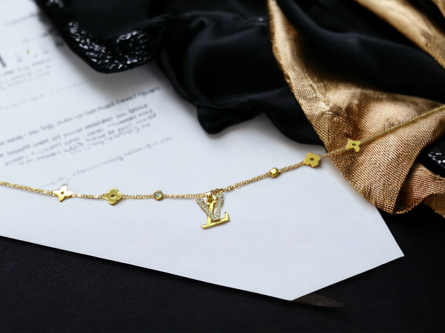 Radiant Gold 'V' Charm Necklace